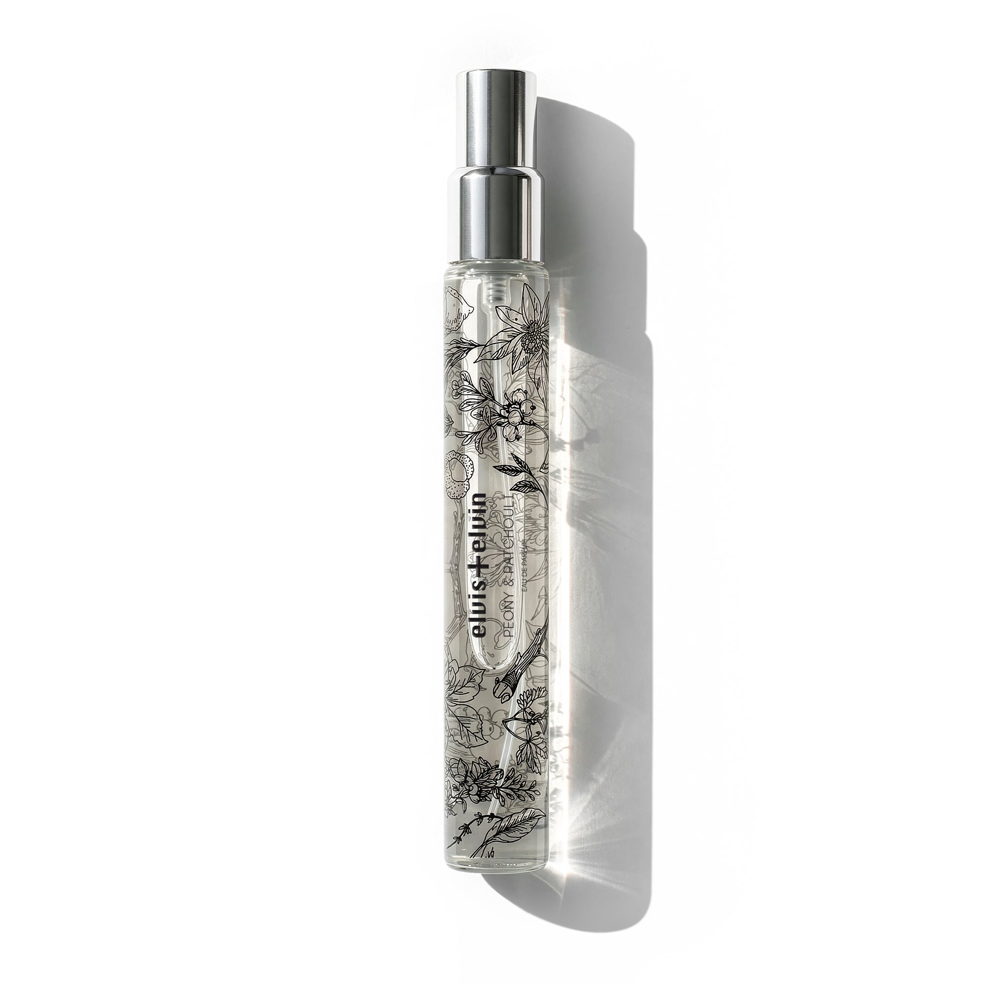 elvis+elvin Peony & Patchouli, 16ml, Clear spray bottle with black floral design on a white background